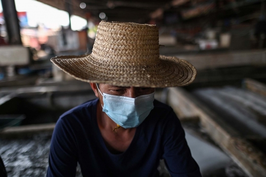 Pilu Pasar Basah Wuhan dalam Lekatan Stigma Corona