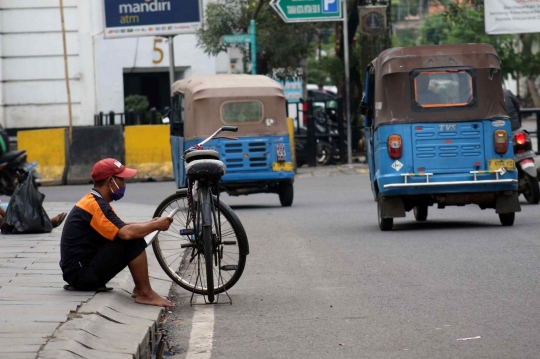 Akibat Pandemi Covid-19, Ojek Sepeda Kian Sulit Cari Penumpang