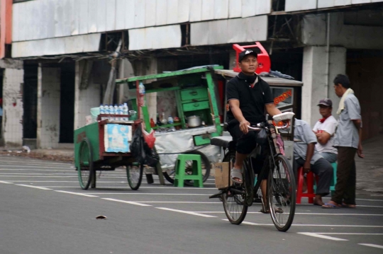 Akibat Pandemi Covid-19, Ojek Sepeda Kian Sulit Cari Penumpang