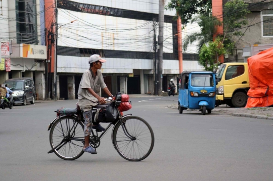 Akibat Pandemi Covid-19, Ojek Sepeda Kian Sulit Cari Penumpang