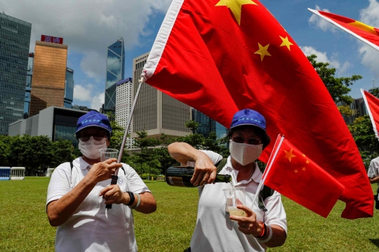 UU Keamanan Disahkan, Pendukung Pro-China di Hong Kong Bersulang Sampanye