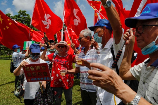 UU Keamanan Disahkan, Pendukung Pro-China di Hong Kong Bersulang Sampanye
