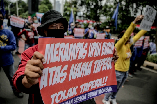 Aksi Menolak Omnibus Law di Senayan