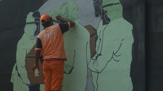Pesan Mural Covid-19 di Bukit Duri untuk Masyarakat