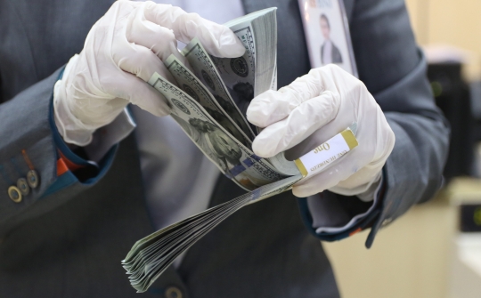 Nilai Tukar Rupiah Melemah di Level 14.640 per Dolar AS