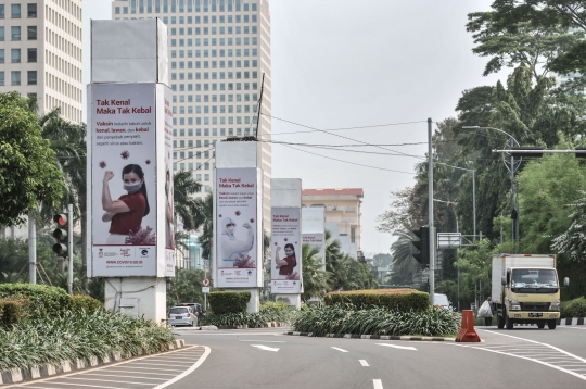 Sosialisasi Vaksin Covid-19 di Tiang Monorel