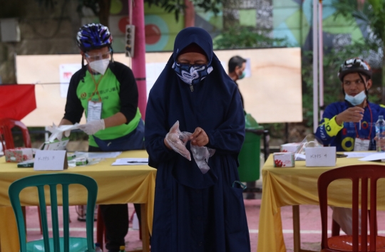 Pemilih Wajib Kenakan Sarung Tangan Saat Pencoblosan Suara di Pilkada Tangsel