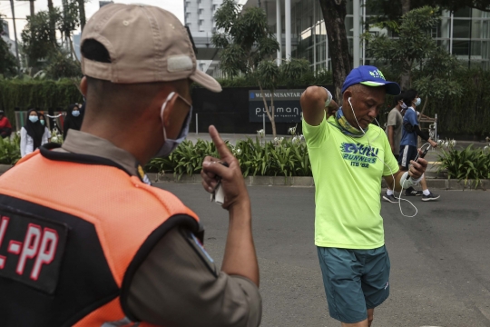Potret Warga DKI Jakarta yang Masih Tak Gunakan Masker dengan Benar