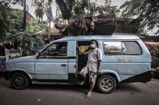 Kisah di Balik Angkot Ondel-Ondel Ibu Kota