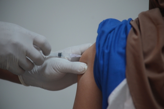 Antusiasme Warga Ikuti Vaksinasi untuk Cegah Penularan Covid-19