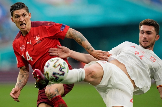 Spanyol Singkirkan Swiss Lewat Adu Penalti