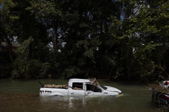 Kondisi Mobil-Mobil Tersapu Banjir Bandang di AS