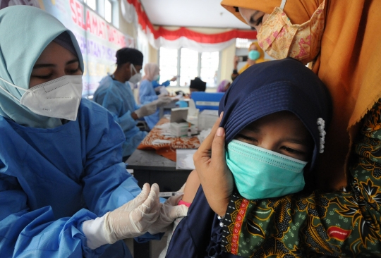 Ekspresi Murid SD saat Kegiatan Bulan Imunisasi Anak Sekolah