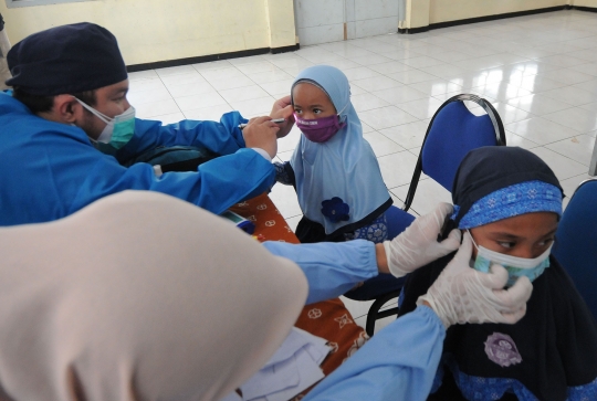 Ekspresi Murid SD saat Kegiatan Bulan Imunisasi Anak Sekolah