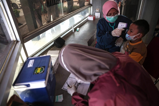 Vaksinasi Covid-19 Anak Usia 6-11 Tahun di Pos Polisi