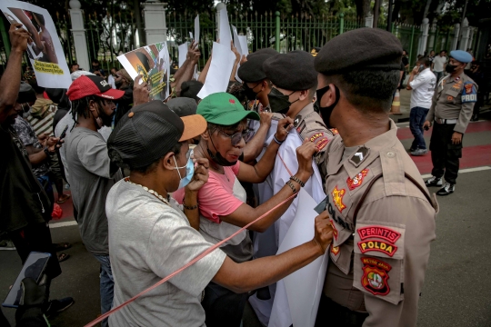 Tuntut Pelaku Penganiayaan Diadili, Massa Mahasiswa Papua Gelar Aksi di Gambir