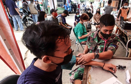 Vaksinasi Booster di Pasar Palmerah