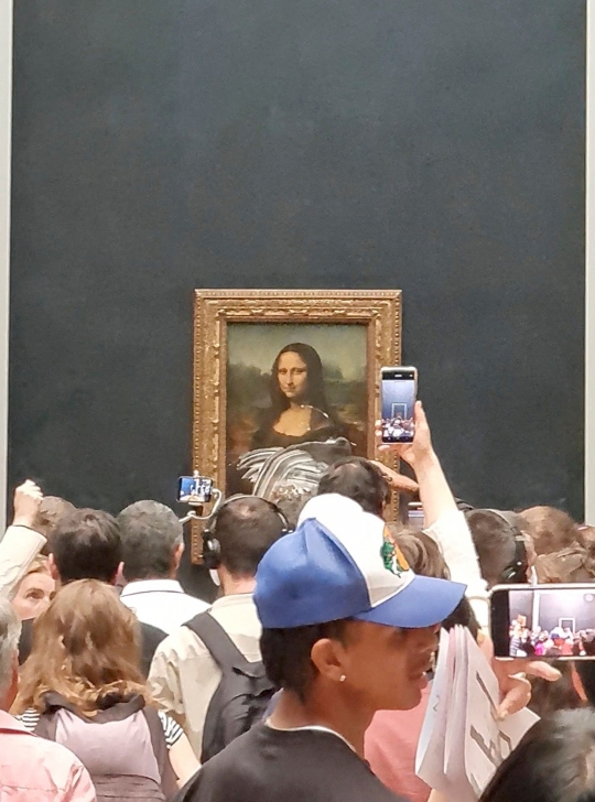 Kondisi Lukisan Mona Lisa Setelah Dilempar Kue