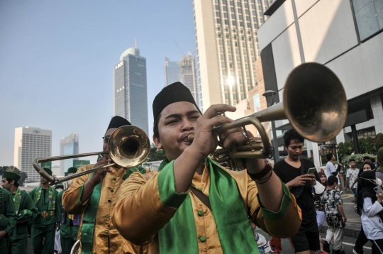 Kemeriahan Pawai Kesenian Betawi Sambut HUT DKI Jakarta