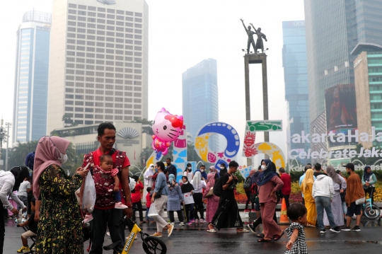 Guyuran Hujan Tak Surutkan Warga untuk Berolahraga di CFD