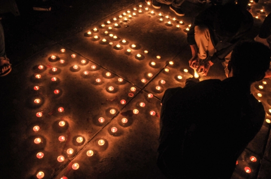 Aksi Solidaritas 4.000 Lilin Mengenang 40 Hari Kematian Brigadir J