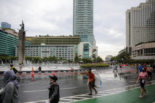 Antusias Warga Olahraga di CFD Usai Diguyur Hujan