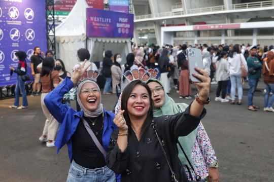 Antusiasme Penggemar Bernostalgia Bareng Westlife di GBK