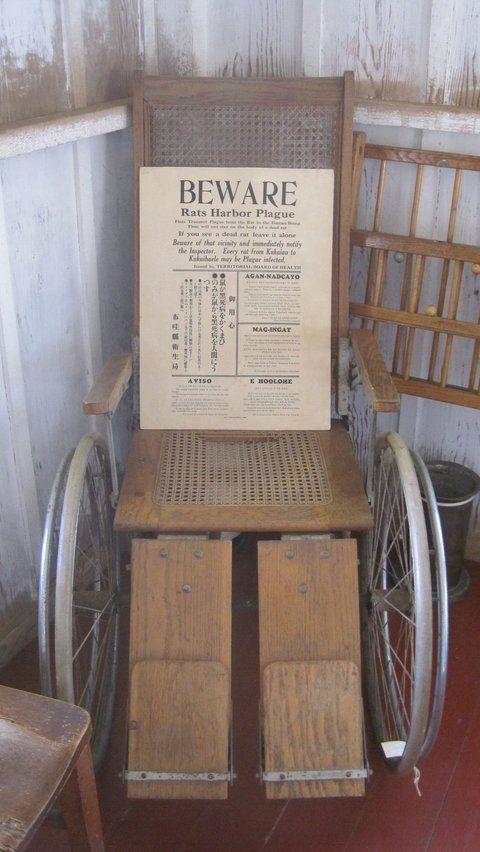 Old wheelchair in infirmary, Hawaii's Plantation Village