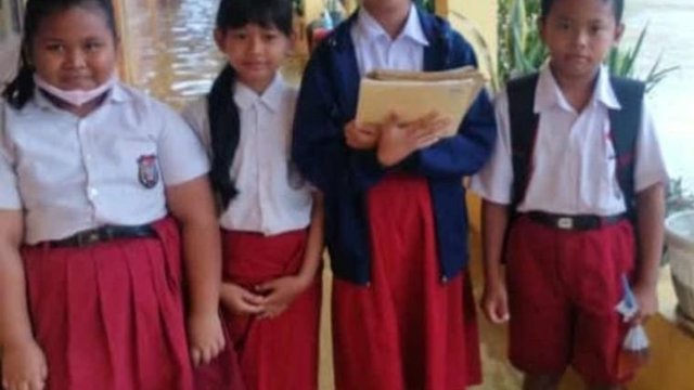 Banjir Susulan di Pati Memaksa Murid SD Ujian Daring