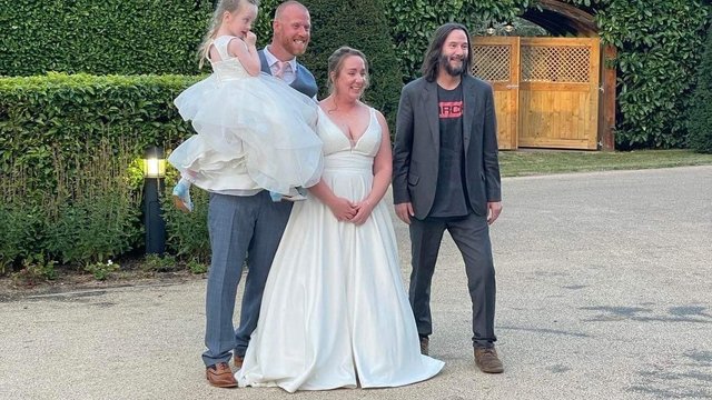 groom behind dress that broke the internet