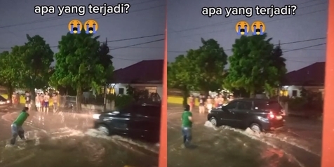 Cegah Pemobil Ngebut saat Banjir, Warga Nekat Adang Pakai Tongkat