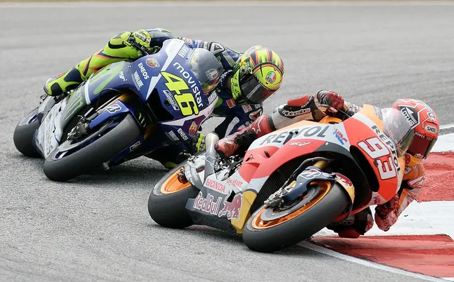 Valentino Rossi dan Marc Marquez (c) AFP