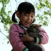 A TALE OF MARI AND THREE PUPPIES
