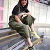 Najwa Shihab pakai Sneakers