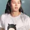 Idol K-Pop cowok pakai blangkon