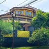 Rumah orangtua Ussy Sulistiawaty