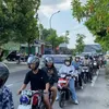 anteran sepeda motor di depan rumah Bella Bonita