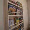 perpustakaan mini Kamar Anak di Rumah Fitri Tropica