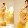 Siti Badriah, maternity shoot, kuning, kehamilan 9 bulan