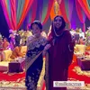Milen Cyrus pakai kaftan dan kerudung