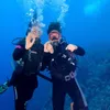 Paramitha Rusady dan anak saat diving