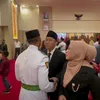 Potret pengukuhan anak Denny Cagur 