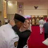 Potret pengukuhan anak Denny Cagur 