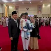 Potret pengukuhan anak Denny Cagur 