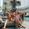 Siti Badriah bersama suami dan anak.