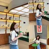Ayu Ting Ting pakai jins dan kardigan