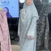 Mila DA7 tampil dengan dress biru