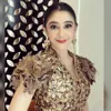 Uut Permatasari dan suami