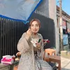 Imel Putri Cahyati Makan di Pinggir Jalan
