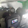 penumpang menyebalkan, penmupang pesawat menyebalkan, foto unik